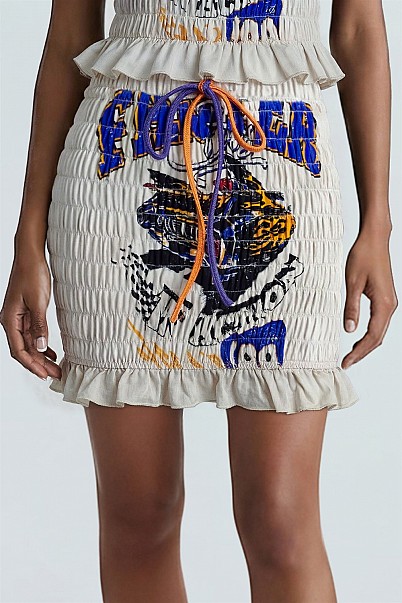 MOTO MUSE SMOCKED GRAPHIC MINI SKIRT